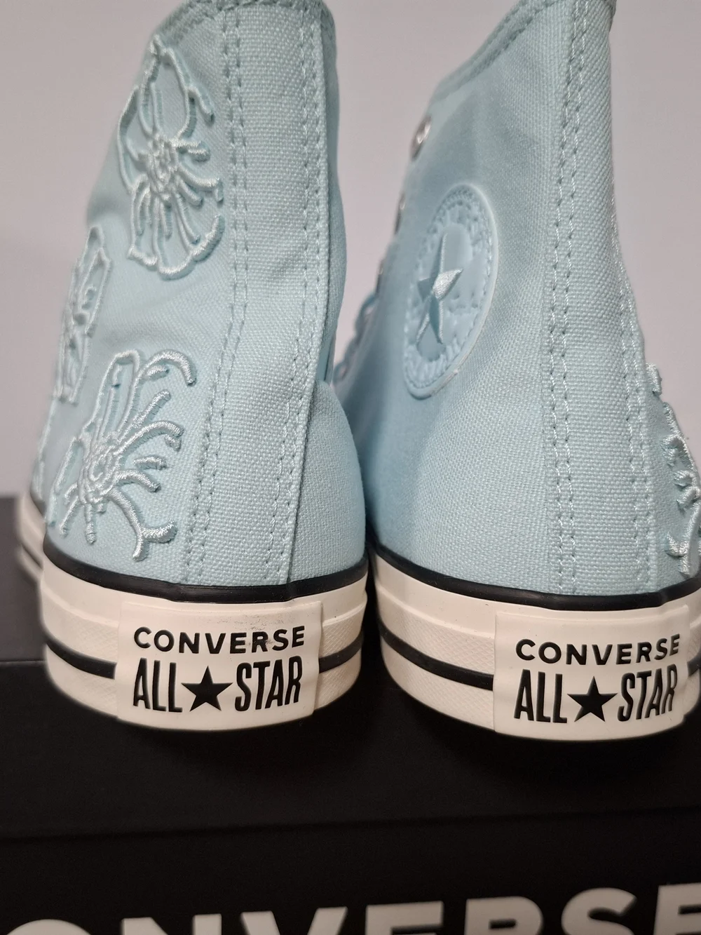 Converse Women’s High-Top Sneakers in Light Blue